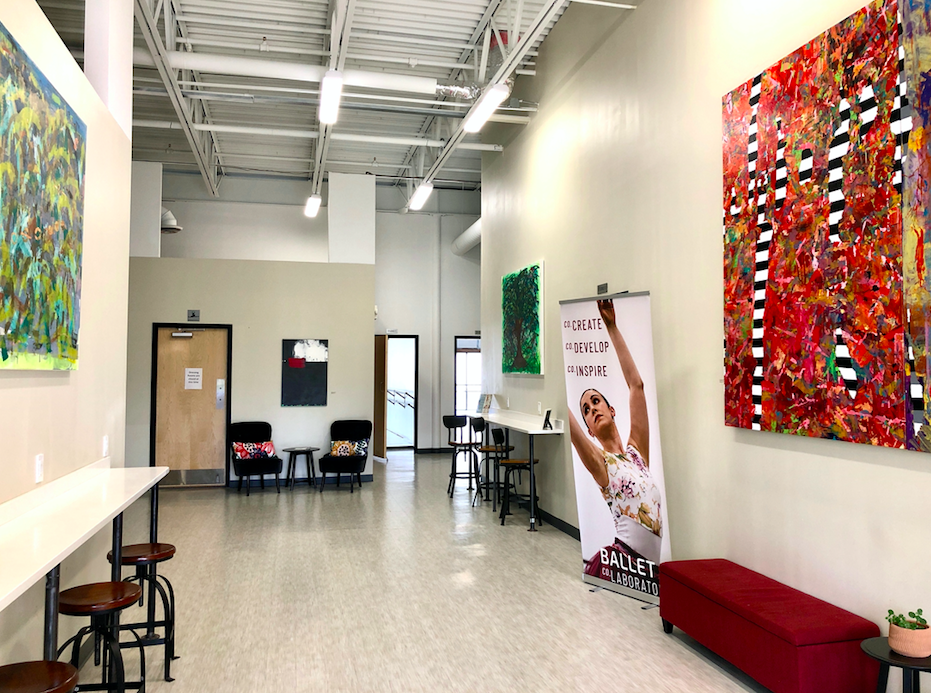 Image of the BCL lobby with white walls and a benches for sitting