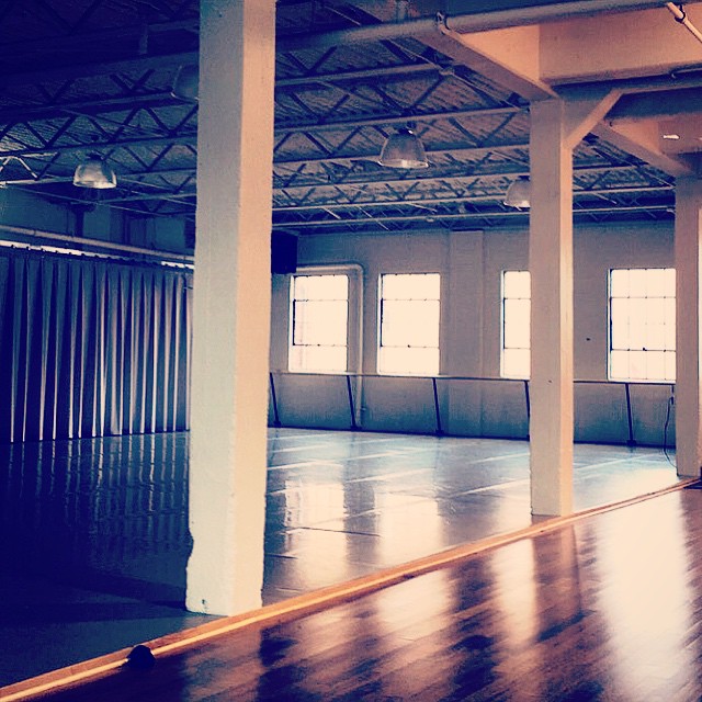 photograph of Tu Dance Center large studio with windows across the room