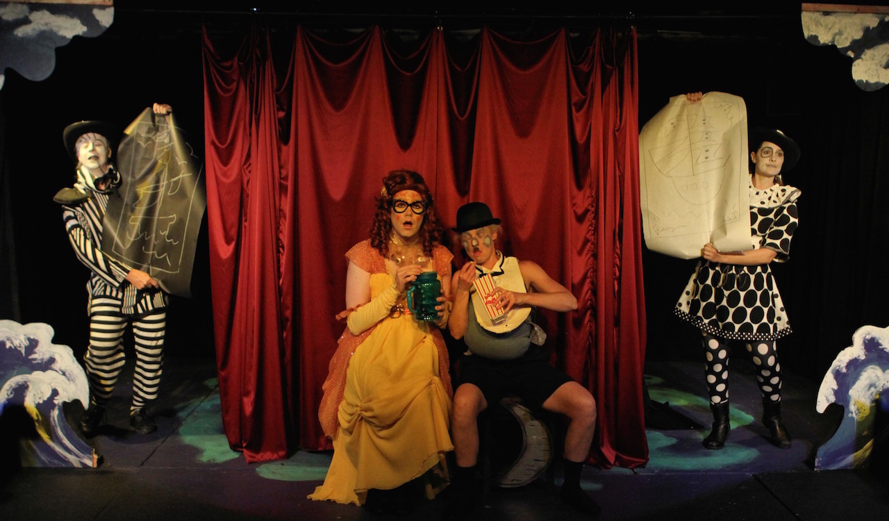 Characters "Stripe" and "Spot" perform in the OLA Garage Tour