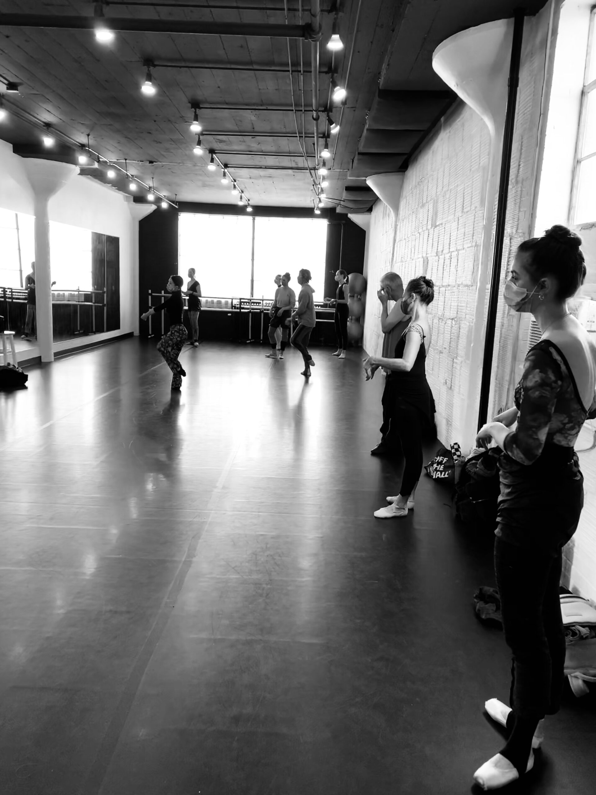 Dancers watch as an instructor demonstrates a phrase in a Hothouse MPLS studio
